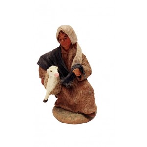 Uomo con pecora sotto...