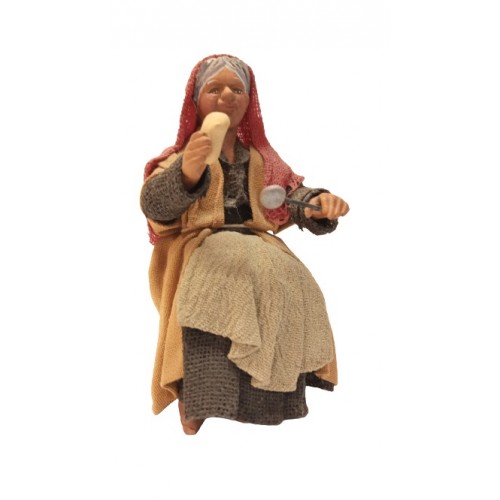 Donna seduta al tavolo cm 12...