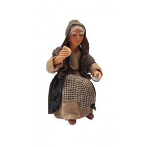 Donna seduta al tavolo...