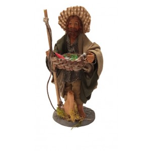 Pescatore con cesto di...