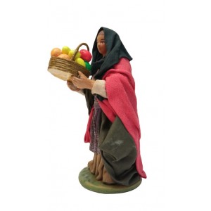 Donna con cesto di frutta...