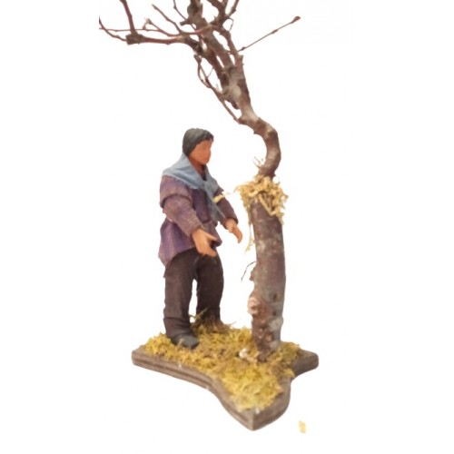 Uomo in libertà vicino l'albero cm 12...