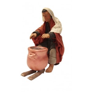 Uomo seduto al bivacco 13...