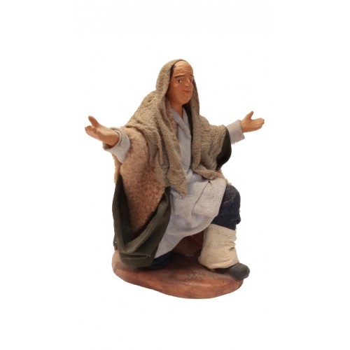 Uomo in ginocchio a braccia aperte 13...