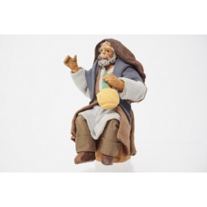 Uomo seduto con fiasco cm...