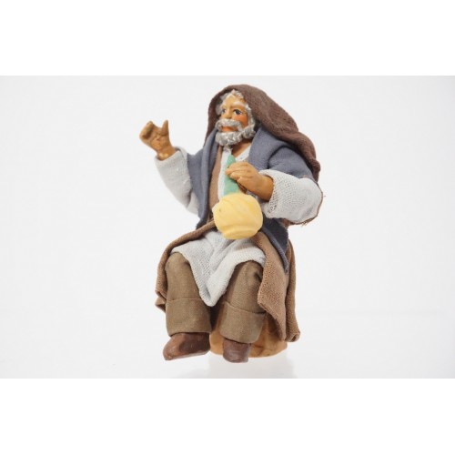 Uomo seduto con fiasco cm 10...