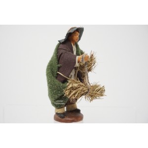 Uomo con fascine di fieno... 2