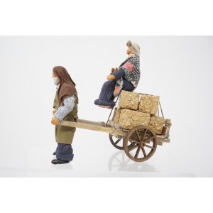 Uomo e donna con carretto... 2