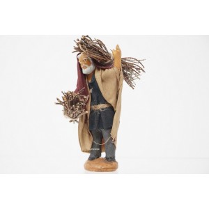 Uomo con fascine di legna...