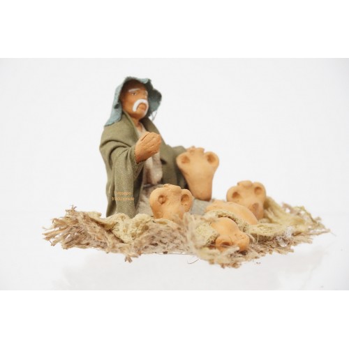 Uomo seduto con anfore cm 7...