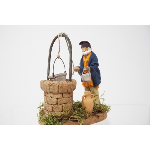 Uomo al pozzo cm 7 terracotta e tessuto