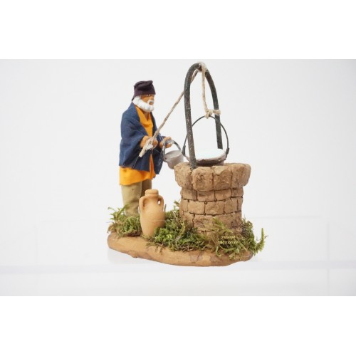 Uomo al pozzo cm 7 terracotta e tessuto