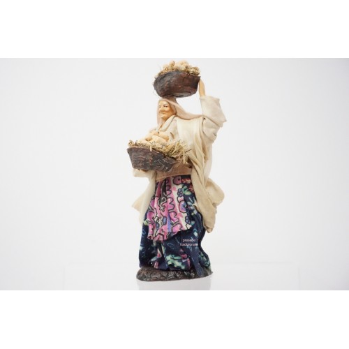 Donna con cesti di uova cm 13...
