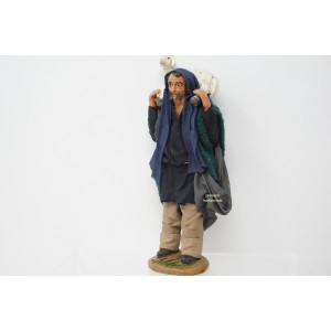 Uomo con pecora con pecora...