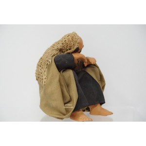 Uomo seduto che riposa cm... 2