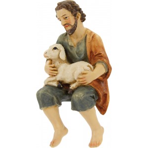 Pastorello seduto con...