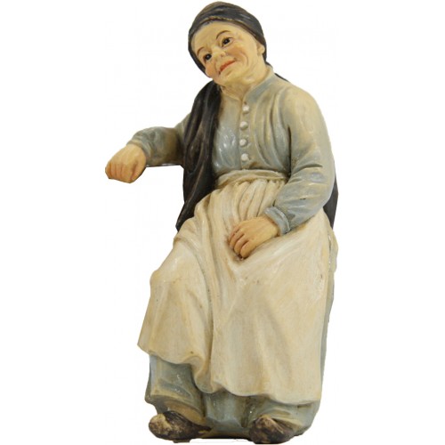 Donna anziana seduta H 8 cm Resina
