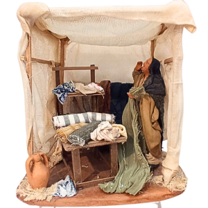 Scena venditore stoffe cm...