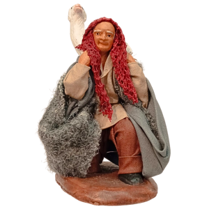 Pastore in ginocchio con...