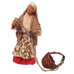 Donna con cesto da calare...