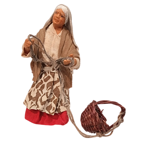 Donna con cesto da calare cm 10...
